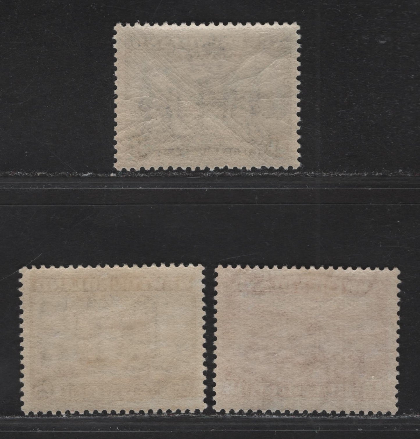 Lot 151 (C) Newfoundland #197, 199, 210 25c - 24c Gray - Prussian Blue Sealing Fleet - Loading Ore, 1932-1937 Definitive Issue, 3 VFOG Singles