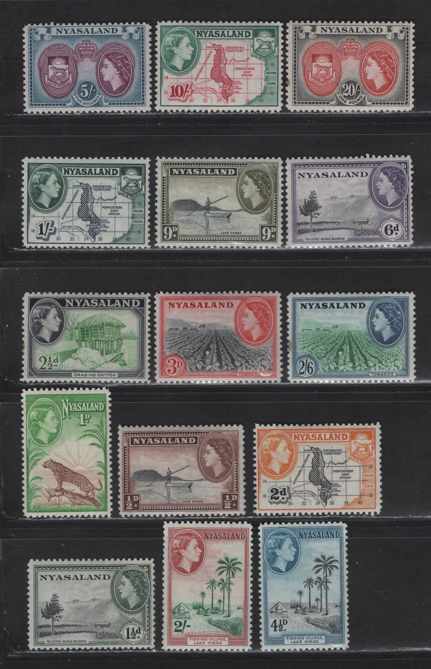 Lot 339 Nyasaland (C) SG#173-187 1/2d - 20/- Black & Chocolate - Scarlet & Black , 1953-1954 Pictorial Definitive Issue, 15 F/VFNH Singles, 2/6 & 20/- Have A Small Stain In The Left Margin, 2/- - 20/- Are NH, Rest Hinged