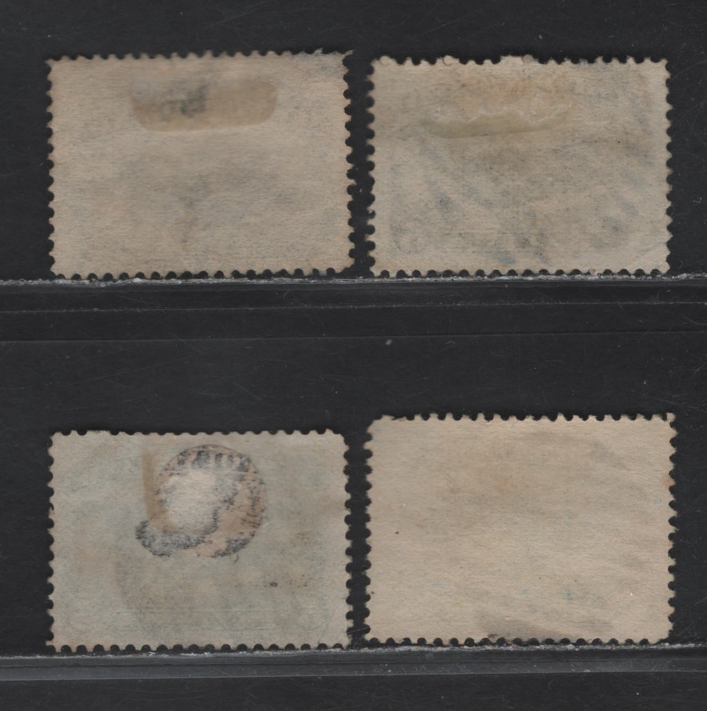 Lot 87 Newfoundland #53,54,55 5c Dull Blue, Deep Blue & Deep Bright Blue, 1880-1896 Third Cents Issue, 4 F & VG Used Singles On Papers Cents-YY, Cents-XX & Cents-LL, All Unchecked As To Perf And With Clear & Full Steel Grid Cancels