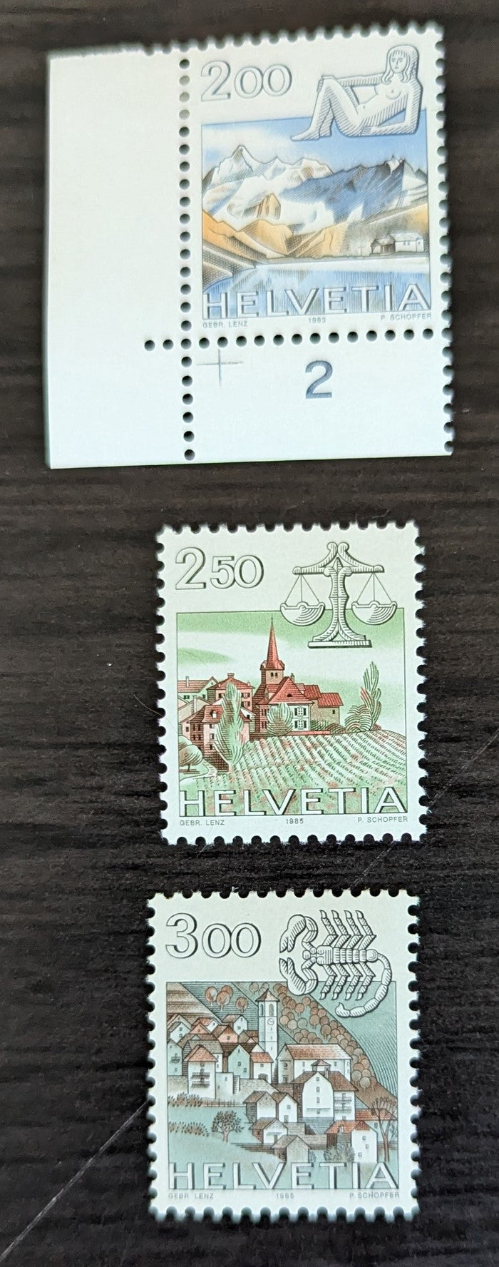 Lot 256 Switzerland SC#725-727 1982-1986 Signs of the Zodiac & City Views Issue, 3 VFOG/NH Singles, Click on Listing to See ALL Pictures, 2017 Scott Cat. $17.25