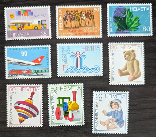 Lot 267 Switzerland SC#803/B530 1986-1987 Mobile P.O, 50th Anniv - Children's Toys Issues, 9 VFOG Singles, Click on Listing to See ALL Pictures, 2017 Scott Cat. $14.4