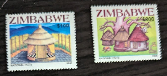 Lot 221 Zimbabwe SC#1022-1023 2006 Huts Issue, 2 VFNH Singles, Click on Listing to See ALL Pictures, 2017 Scott Cat. $12