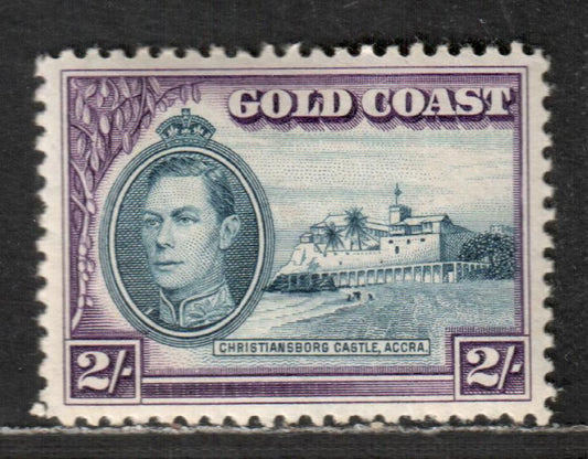 Lot 44 Gold Coast SG#130 2/- Blue & Violet 1938-1941 George VI And Christiansborg Castle Issue, 1938 Printing With Uncommon Line Perf 12, Instead Of Comb 11 1/2x12, A VFOG Single, Click on Listing to See ALL Pictures, Estimated Value $35