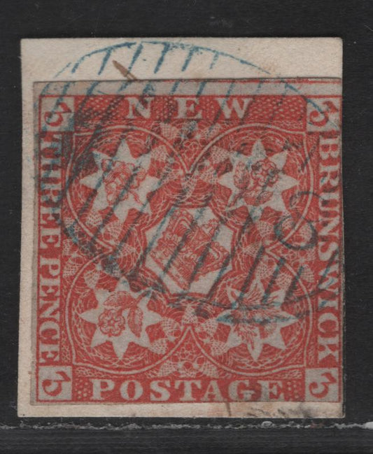 Lot 312 (C) New Brunswick #1a 3d  Dark Red Crown & Heraldic Flowers, 1851-1860 Pence Issue, A VG Used Single On Piece With Blue #8 Chatham Grid Cancel, RF#5 Corresponding To Very Scarce