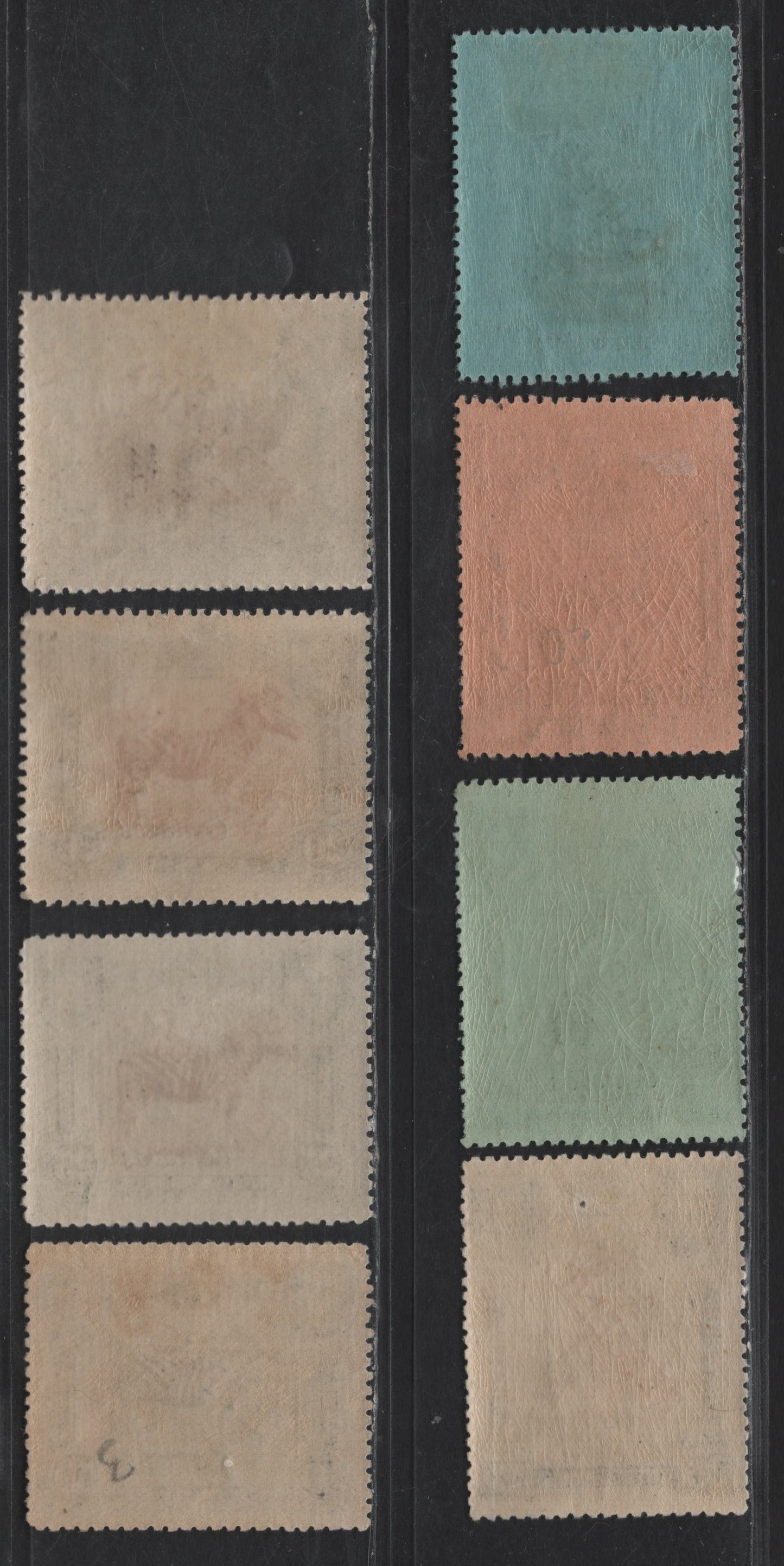 Lot 269 Nyassa SC#83, 85-87, 89-91, 93 1/2c on 5r - 20c on 200r Black - Black & Deep Green on Salmon Camels - Ship, 1921 Lisbon Surcharged Pictorial Issue, 8 F/VFOG Singles