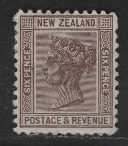 Lot 182 New Zealand SG#243 6d Brown Queen Victoria, 1895-1900 Second Queen Victoria Sideface Issue, A FOG Single, Perf 11, Wmk 12b, Vertical Mesh Paper, Small Internal Wrinkle