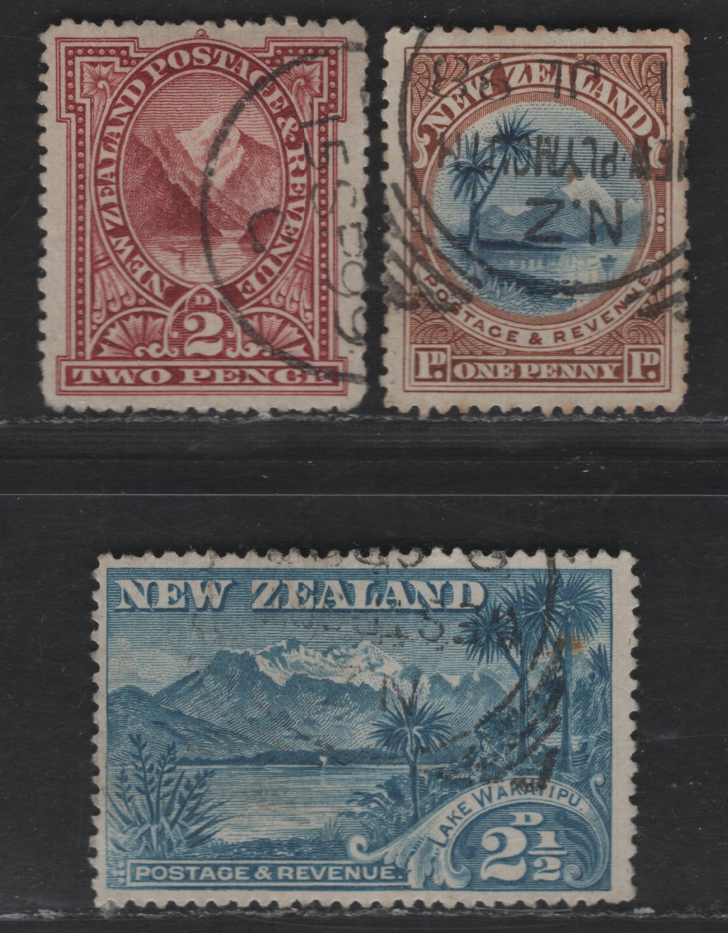 Lot 192 New Zealand SG#247-248, 250 1d - 2.5d Blue & Yellow Brown - Sky Blue Lake Taupo & Mount Ruapehu - Lake Wakatipu, 1898 Pictorial Issue, 3 Fine/Very Fine Used Singles, Inscription Spelled Wakatipu