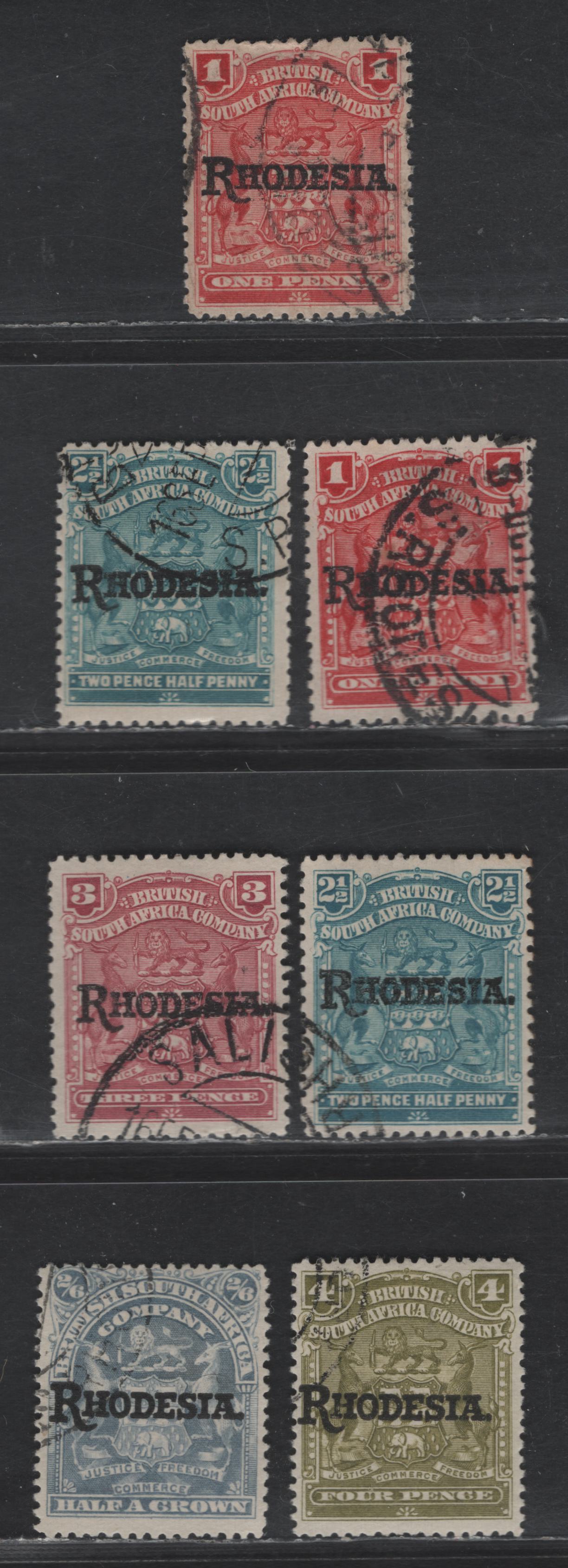 Lot 309 Rhodesia SG#101,c, 103-105, 108 1d - 2/6 Carmine Rose - Bluish Gray Arms, 1909-1912 Rhodesia Overprinted Issue, 6 Fine/Very Fine Used Singles, Shade Variations