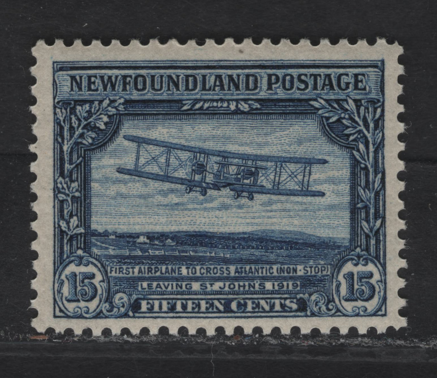 Lot 277 (C) Newfoundland #156 15c Dark Blue First Nonstop Transatlantic Flight, 1928 Pictorial Issue, A VFOG Single, Paper WM-I, Line Perf 14.1x13.8