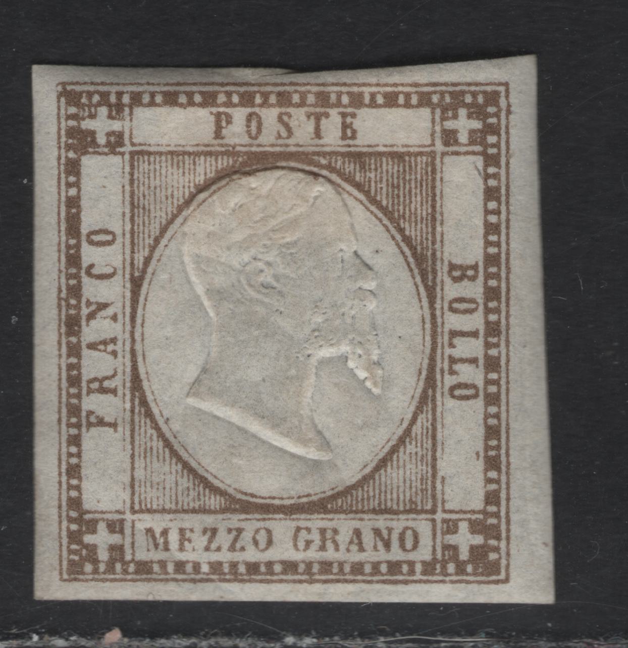 Lot 7 Neapolitan Provinces SC#20b 1/2g Gray Brown King Victor Emmanuel II, 1861 King Victor Emmanuel II Issue, A VFOG Single, Posesses All Genuine Characteristics, Left Margin is Full, Right Is Oversized, Top & Bottom Are Slightly Less Than Full.