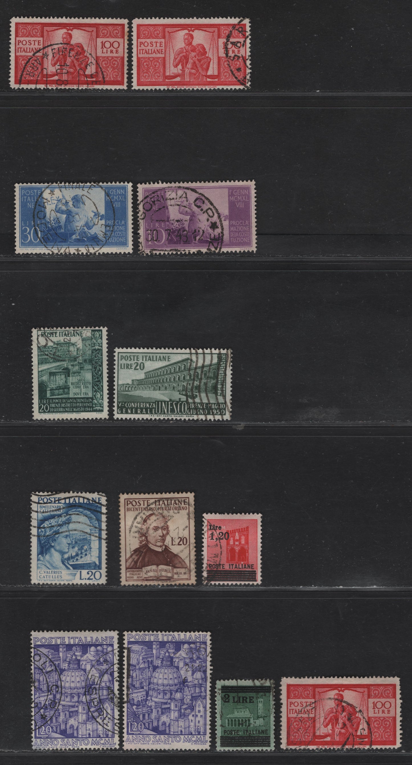 Lot 299 Italy SC#461-462, 477-478a, 493-494, 528-529, 540, 535, 533 1.2L on 20c - 100L Crimson-Brown Logia dei Merccanti - Muratori, 1945-1950 Surcharges - Muratori Issue, 13 Fine & VF Used Singles Including Both Perfs Of 100L, Plus Shades