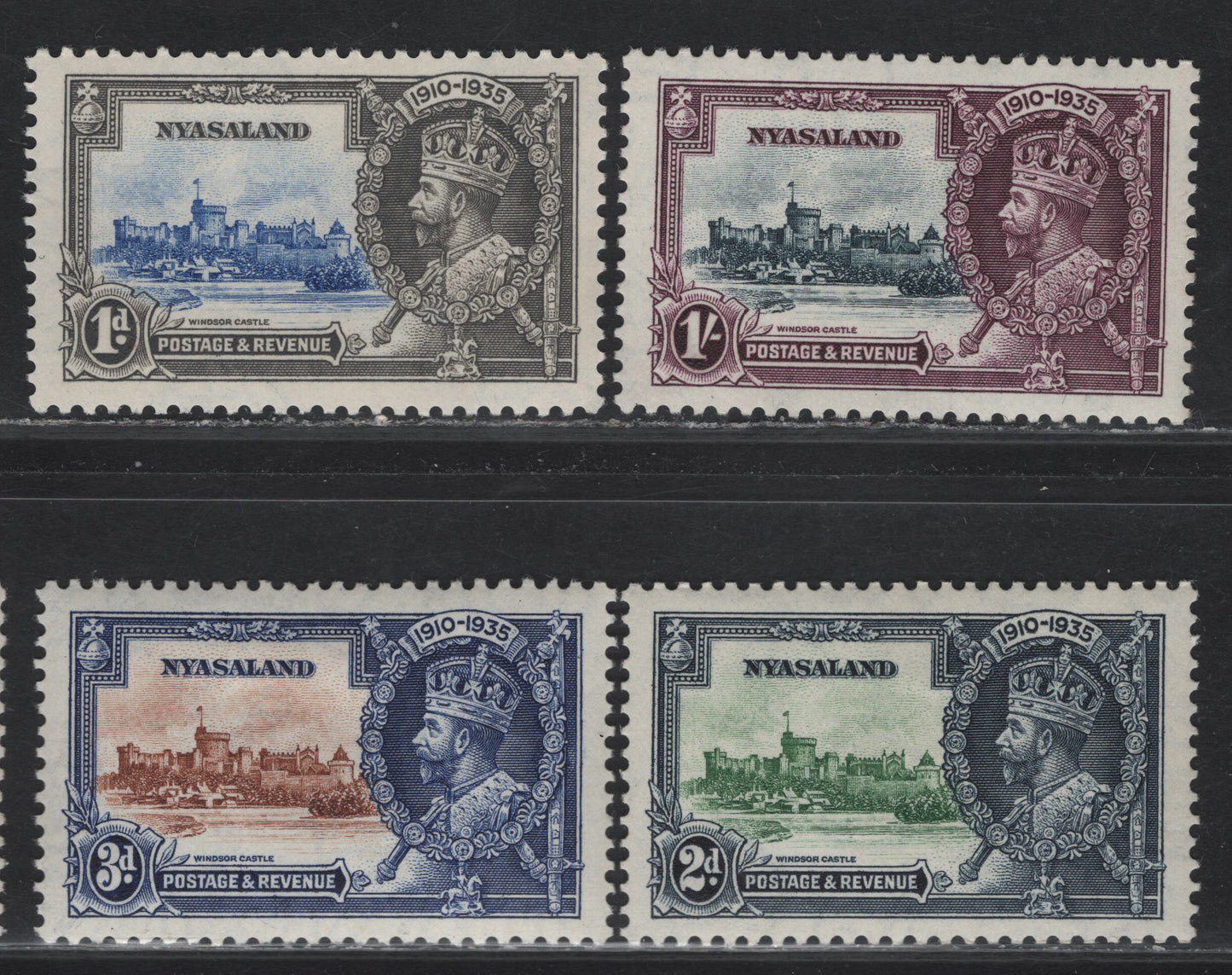 Lot 267 Nyasaland SG#123-126 1d - 1/- Ultramarine & Gray - Slate & Purple KGV & Windsor Castle, 1935 Silver Jubilee Issue, 4 VFOG Singles