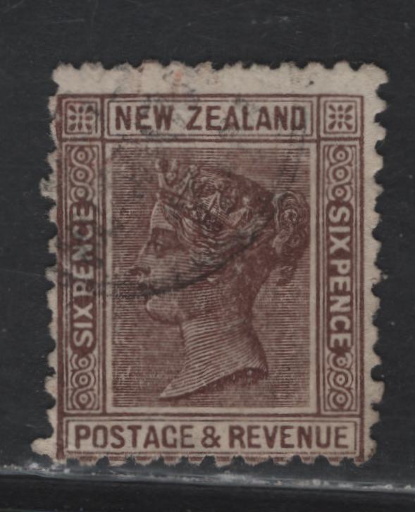 Lot 86 New Zealand (C) SG#212 6d Brown Queen Victoria, 1890 Queen Victoria Sidefaces Issue, A Fine Used Single, Perf 12x11.5, Wmk Star & NZ, 4mm between Star & NZ.