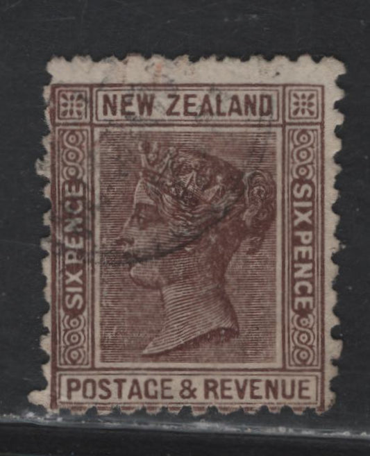 Lot 86 New Zealand (C) SG#212 6d Brown Queen Victoria, 1890 Queen Victoria Sidefaces Issue, A Fine Used Single, Perf 12x11.5, Wmk Star & NZ, 4mm between Star & NZ.
