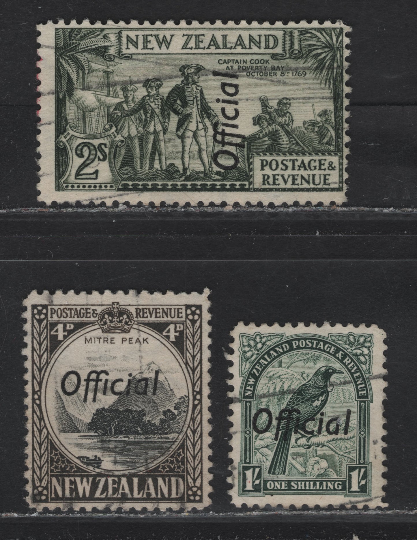 Lot 333 New Zealand (C) SG#O126b, O131b, O132c 4d - 2/- Black & Sepia - Olive Green Mitre Peak - Capt Cook At Poverty Bay, 1936-1961 Official Overprinted Pictorial Issue, 3 Fine Used Singles, Perf 12.5