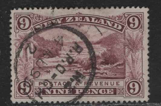 Lot 46 New Zealand (C) SG#256 9d Purple Pink Terrace, Rotomahana, 1898 Pictorial Issue, A Very Fine Used Single, Unwatermarked, Perf 12-16, SON August 4 1899 RPO CDS Cancel.