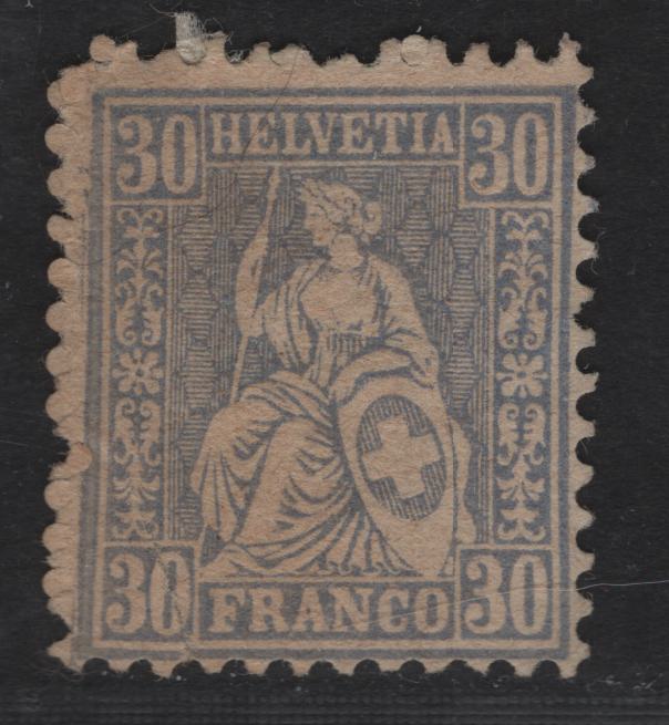 Lot 14 Switzerland SC#56a 30c Blue Seated Helvetia, 1867-1878 Seated Helvetia Issue, A Good Unused Single, Fine Appearing Unused Example Of This Scarce Shade, Severe Crease In LR Corner That Ends In Tear