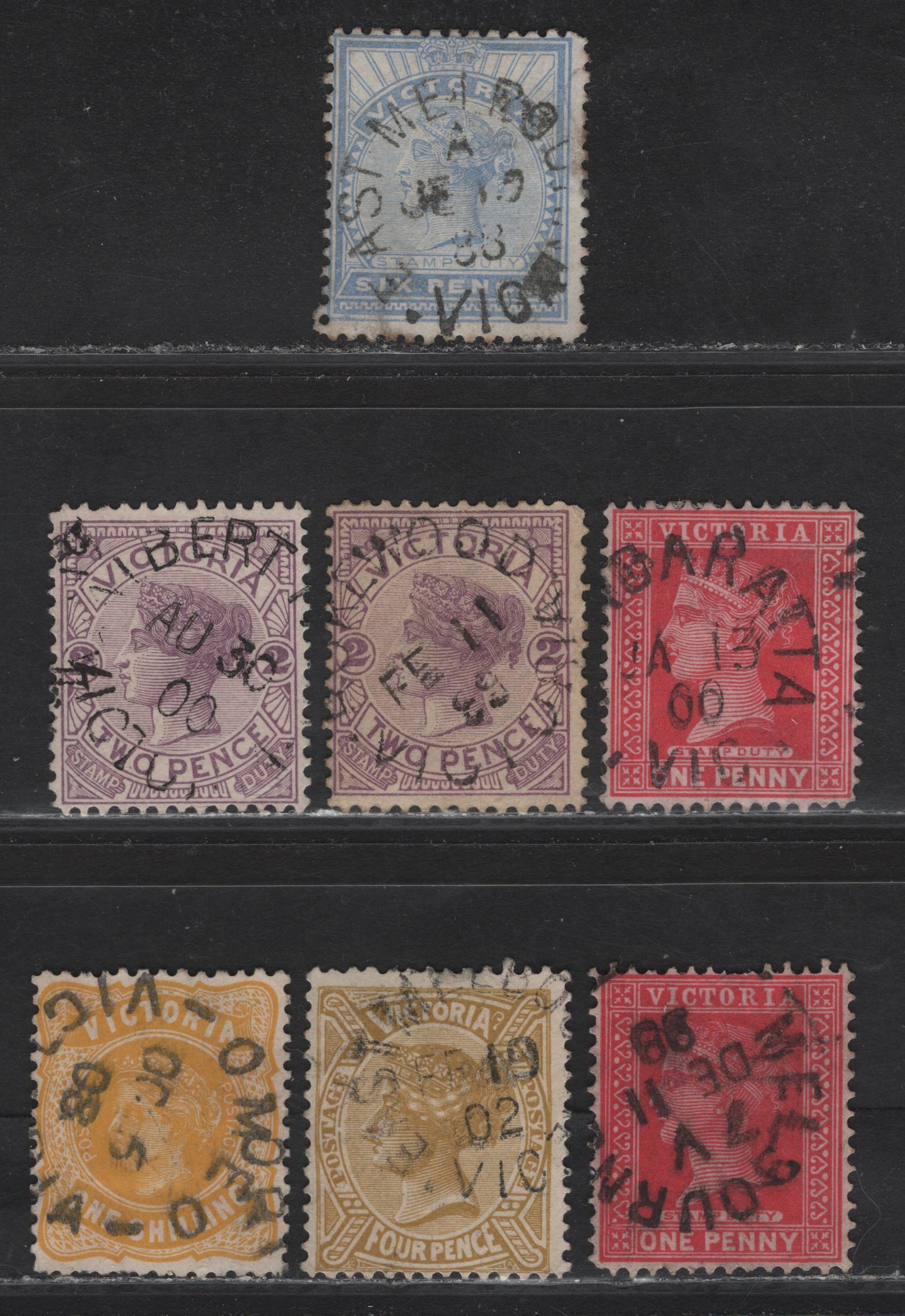 Lot 135 Australia - Victoria (C) SG#318a, 311a, 334, 359, 357a, 390a, 394b, 1896-1910 Stamp Duty - Postage Issues, 7 Fine/Very Fine Used Singles, Split Ring Town Cancels, Including Oraeo, East Melbourne, Rokewood & Others