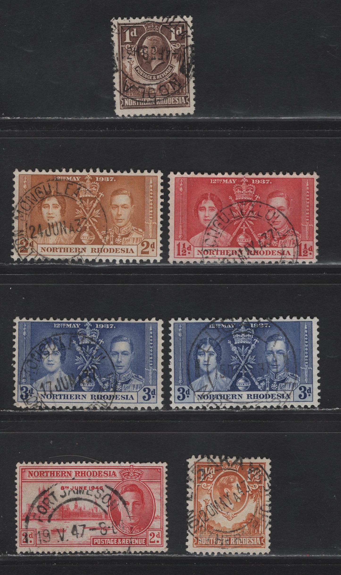 Lot 131 Northern Rhodesia (C) SG#22-24, 2, 30, 47 1d - 2d Brown - Carmine King George V, 1925-1946 Definitive - Victory Issues, 7 Very Fine Used Singles, SON Town Cancels Including Monguleali, Fort Jamieson, Ndola & Lusaka