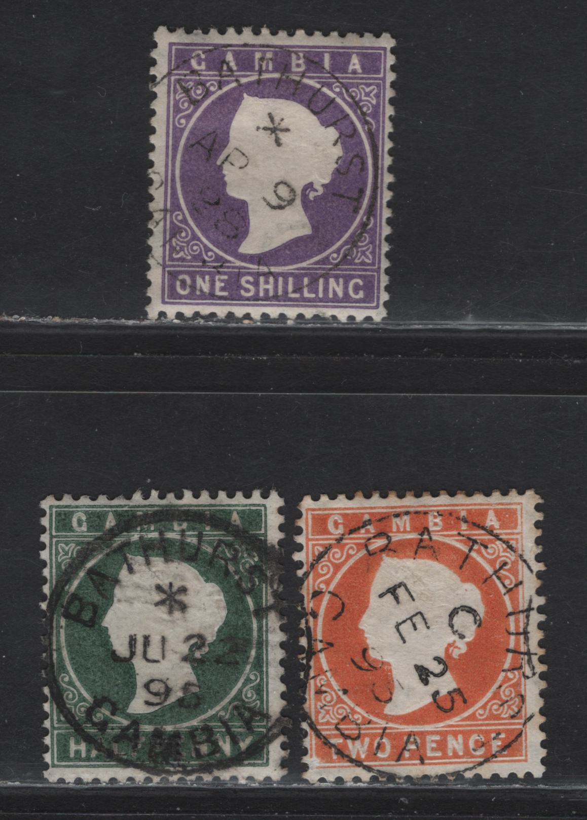 Lot 84 Gambia (C)  SG#21, 24, 35 1/2d - 1/- Myrtle Green - Violet Queen Victoria, 1886-1893 Cameo Issue, 3 Fine Used Singles, Sideways Crown CA Wmk, SON Bathurst CDS Cancels, Dated Feb 25 1895, June 22 1895 7 April 9 1898.