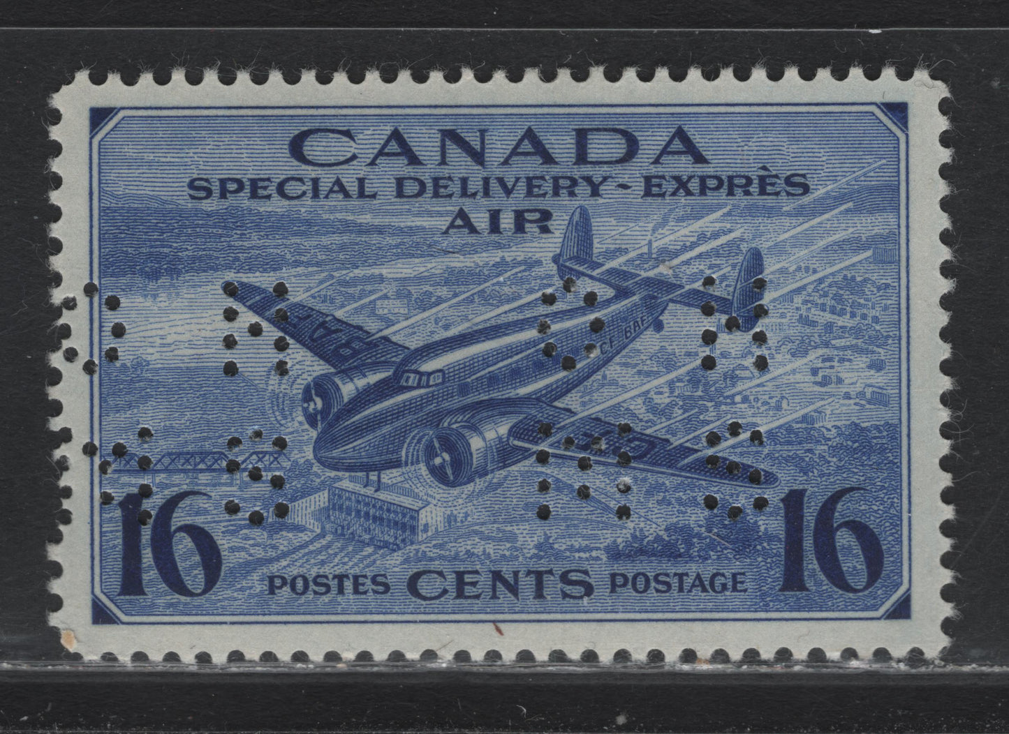 Lot 261 Canada (C) #O9-CE1 16c Deep Ultramarine Trans-Canada Airplane, 1942-1943 Airmail Special Delivery Issue, A VFOG Single, CBN-JJJJJ Paper, Perf 11.95x11.9, 4-Hole OHMS Perfin, Original Die, Position 1.