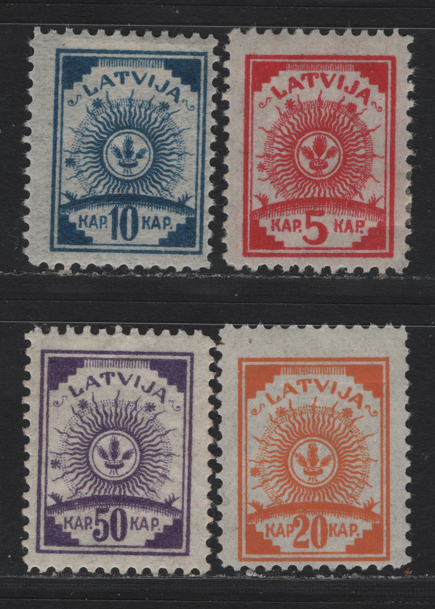 Lot 195 Latvia SC#18-19, 21, 23 5k - 50k Carmine - Purple , 1919 Arms Issue, 4 FOG Singles, Perf 11.5,