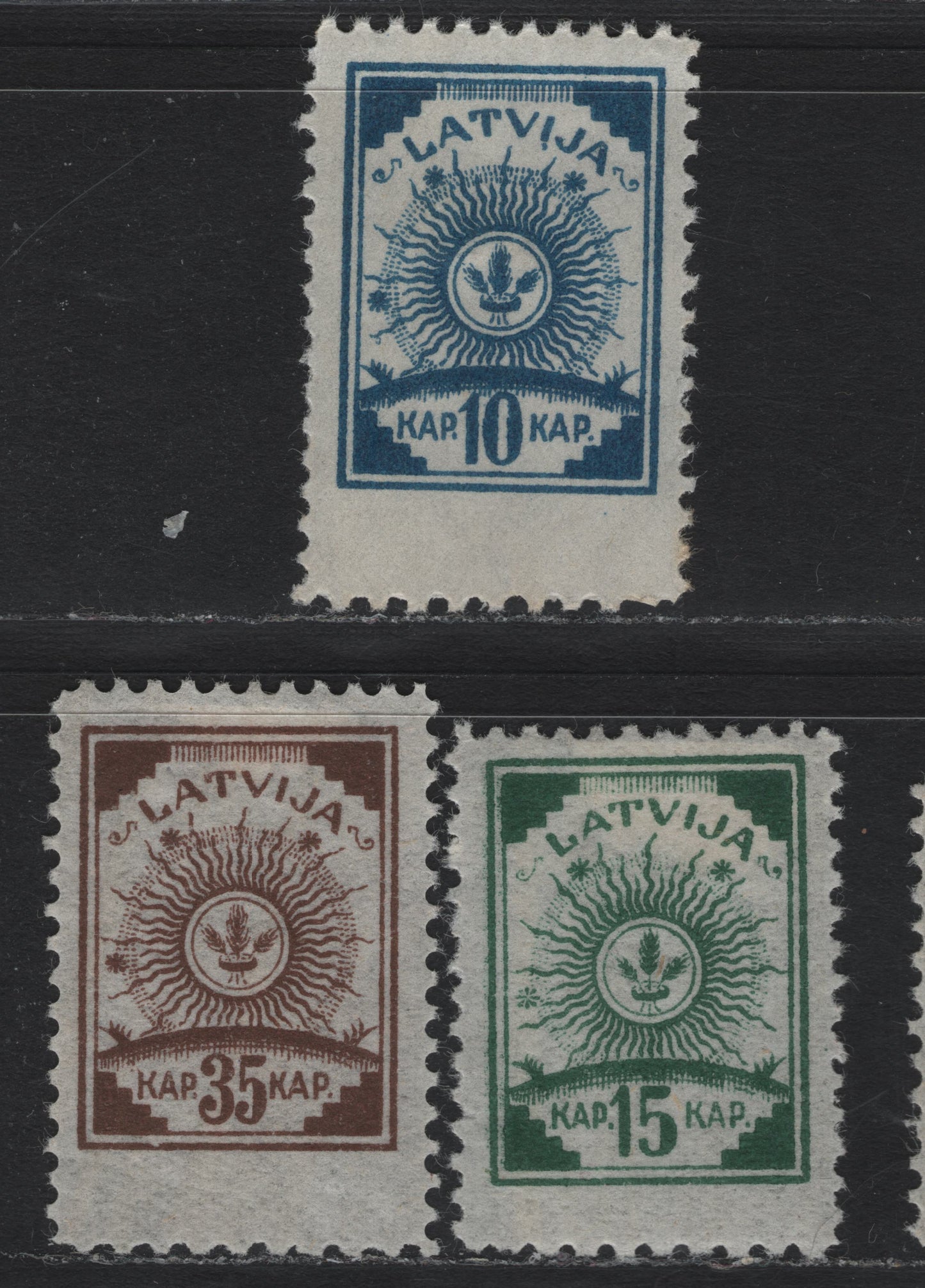 Lot 196 Latvia SC#27-28, 31 10k - 35k Deep Blue - Dark Brown , 1919 Arms Issue, 3 VFOG Bottom Sheet Margin Singles, Perf 11.5x11.5x10x11.5, Perf 10 At Bottom