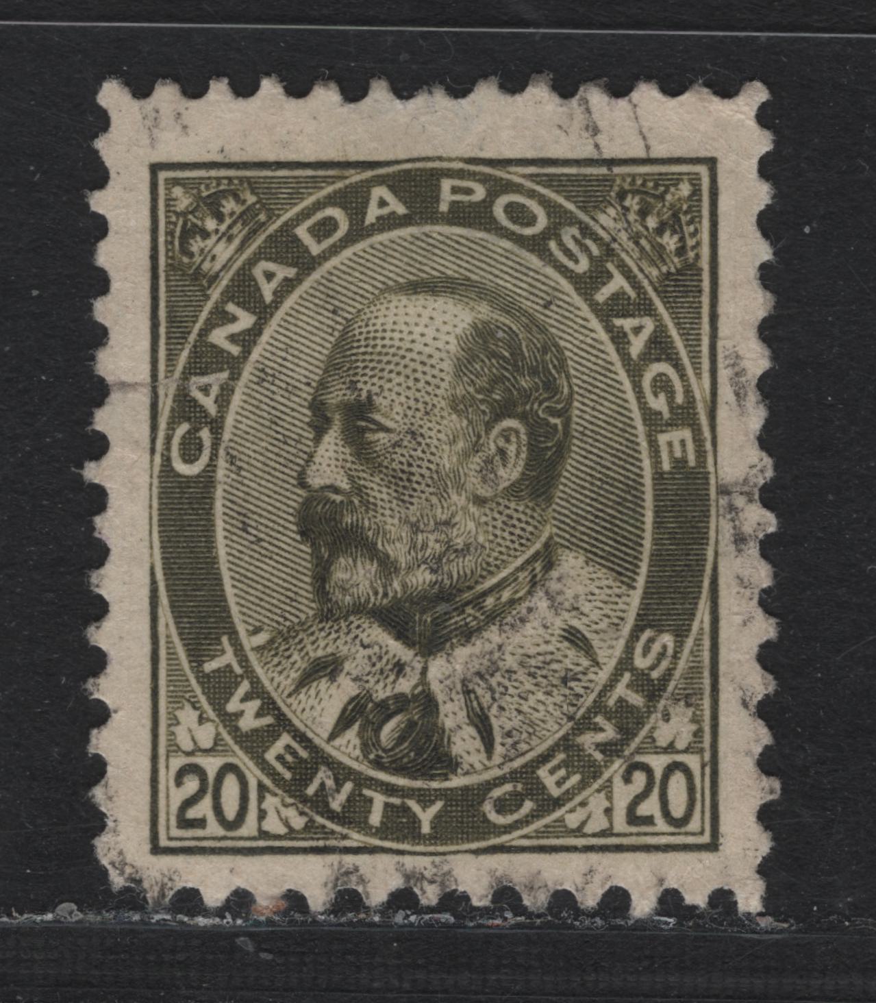 Lot 16 Canada #94i 20c Deep Olive, 1903-1908 King Edward VII Issue, A Good Used Single, ABN-A Paper, Perf 12, Small Tear From Left Margin Through 'A' of Canada & Shallow Thin.