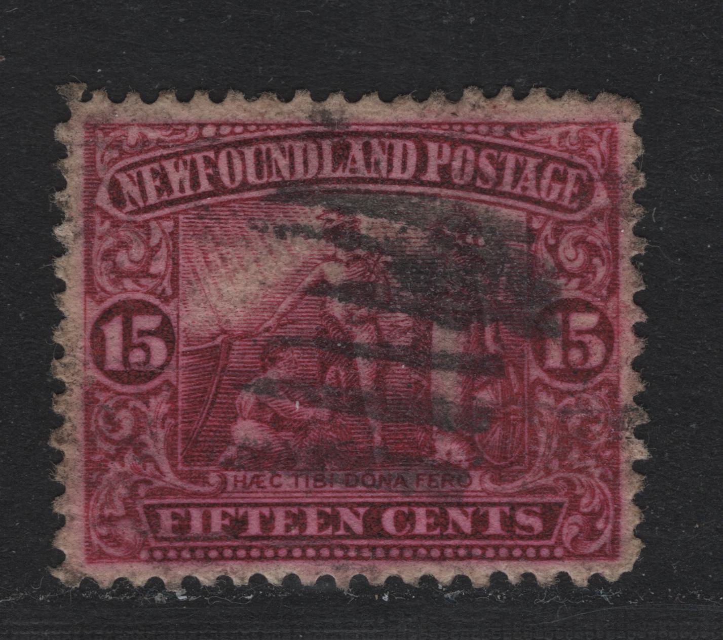 Lot 242 Newfoundland #114 15c Bright Magenta, 1919 Trail of the Caribou Issue, A Fine Used Single, WM-E Paper, Line Perf 14, The Color I Believe, Has Been Chemically Affected.