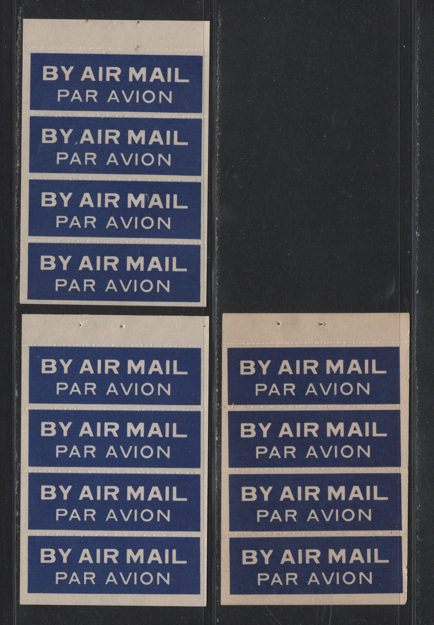 Lot 396 Canada Unlisted,  3 VFNH Panes Of 4 Airmail Labels From 1947 Gift Booklet, Printed In 3 Different Shades Of Blue On White Vert. Ribbed Paper, All Three Show Different Gum Types.