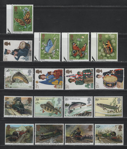 Lot 215 Great Britain SG#941-944, 983-986, 1011-1014, 1093-1097 14p - 34p Multicolored , 1981-1985 Butterflies - Trains Issues, 17 VFNH Singles
