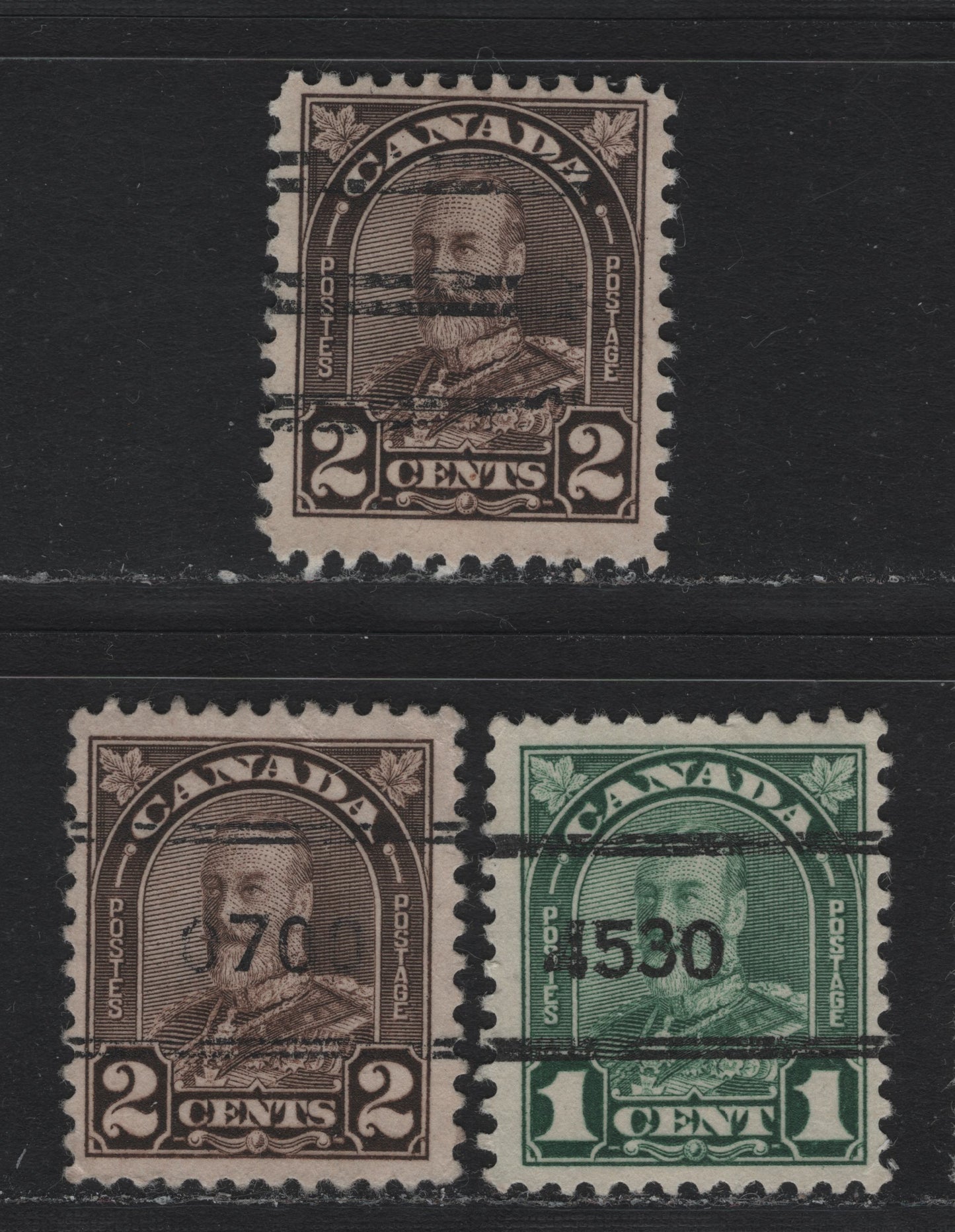 Lot 279 Canada #163xx, 166xx 1c - 2c Myrtle Green - Dark Brown , 1930-1931 KGV Arch/Leaf Issue, 3 Fine/Very Fine Used Singles, Die 2, Toronto Numeral Precancel, Die 2 With Style V & Montreal Numeral Precancel Unchecked As To Specific Papers.