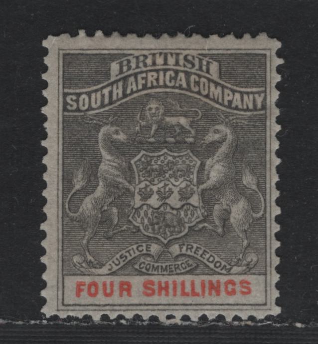 Lot 329 Rhodesia (C) SG#26 4/- Gray Black & Vermillion , 1892-1895 Arms Issue, A VGOG Single, Very Tiny Tear At Top Margin Above 'H' of British
