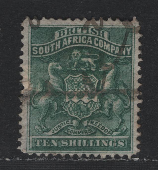 Lot 330 Rhodesia (C) SG#9 10/- Deep Green , 1892-1895 Arms Issue, A Poor Used Single, Expertly Repaired With Fiscal Cancel, The Repairs Consist of A Patched Missing Piece At Center left & Sealed Scissor Cut
