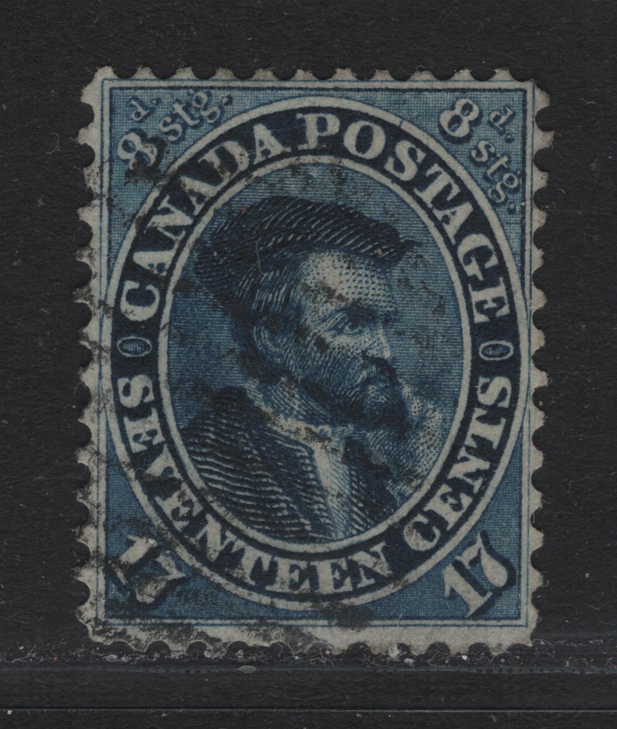Lot 365 Canada #19 17c Blue , 1859-1864 First Cents Issue, A Very Good Used Single, Cents-C Paper, Perf 12, Showing Line Into Outer Medallion Between GE of Postage, Plate Dot Inside Left Medallion Ornament.