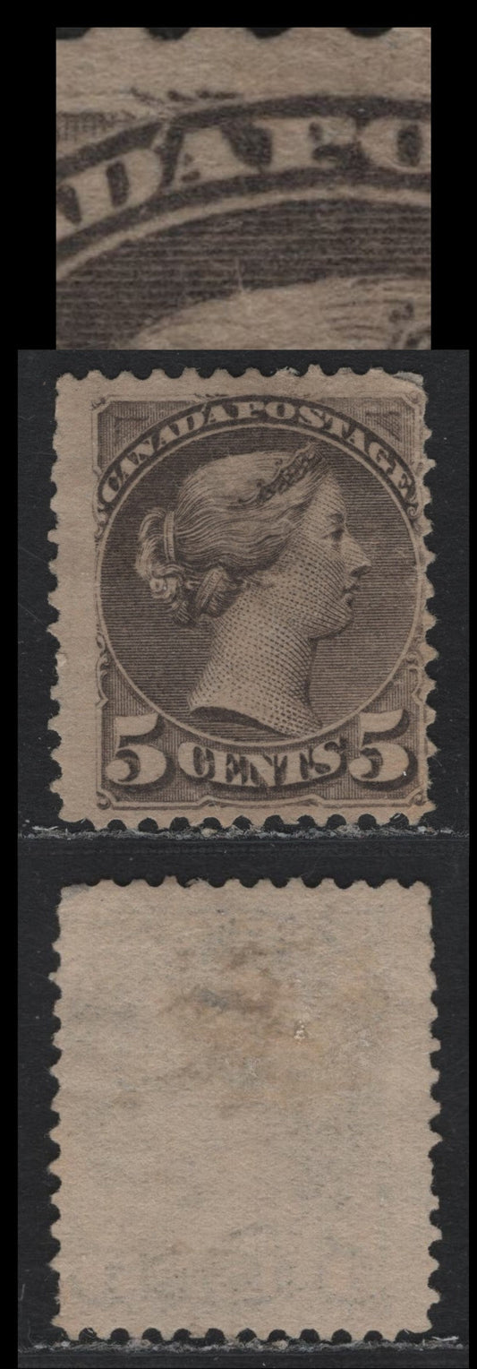 Lot 324 Canada (C)#42var 5c Gray , 1888-1897 Small Queen Issue, A Very Good Used Single, 2O-H Paper, Showing Unlisted Accent On D of Canada, Unlisted In Unitrade, Some Short & Frayed Perfs.