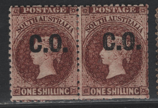 Lot 123 Australia - South Australia SG#80var 1/- Lake Brown , 1868-1879 Humphreys Head Issue, A VGOG Pair, Perf 11.5-12.5, Black CO Overprint, Perf Slightly Clipped At Base, Very Rare Mint Pair.
