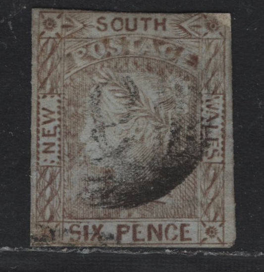 Lot 307 Australia - NSW SG#73 6d Vandyke Brown , 1852-1853 Laureate Issue, An Ungraded Used Single, Medium Bluish Wove Paper, Expertly Repaired By Adding To The Lower left & Upper Right, Where The Design Was Cut Away.