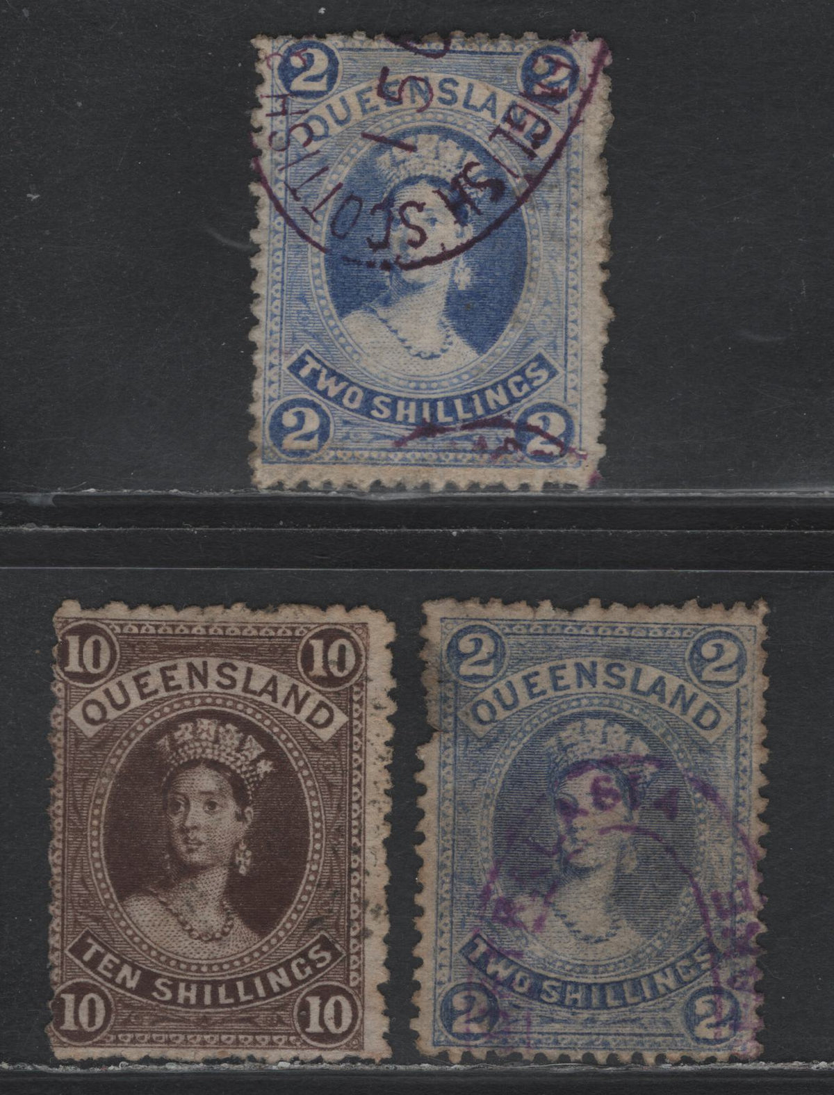 Lot 392 Australia - Queensland SG#132, 155 2/- - 10/- Bright & Dull Blue - Brown , 1879-1881 First Sideface Issue, 2 Very Good/Fine Used Singles, Thin Paper, 2 Pointed Crown Over Q Wmk, Dull Blue Has A Major Re-Entry, Most Of The Design Is Doubled.
