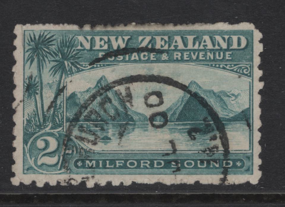 Lot 358 New Zealand (C) SG#269 2/- Blue Green Milford Sound, 1899-1903 Pictorial Issue, A Fine Used Single, Perf 11, Thick, Soft Pirie Paper, Unwateramrked.