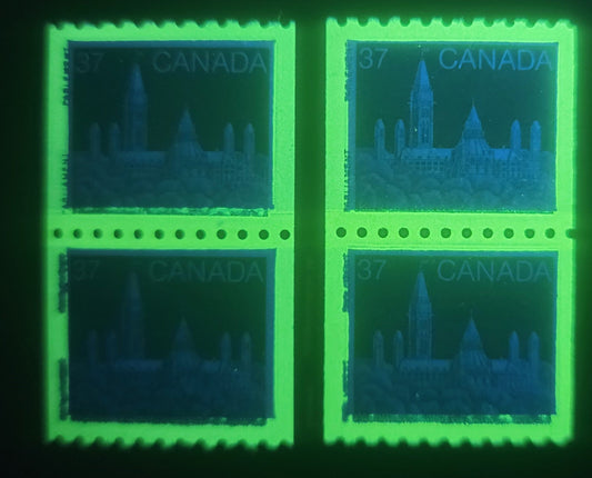 Lot 150 (C) Canada #1194var 37c Blue Parliament Buildings, 1988-1991 Mammal & Architecture Issue, A VFNH Coil Pair On DF Peterborough Paper Showing Horizontal Tagging Shift In Which Taggant Appears Between Inscriptions