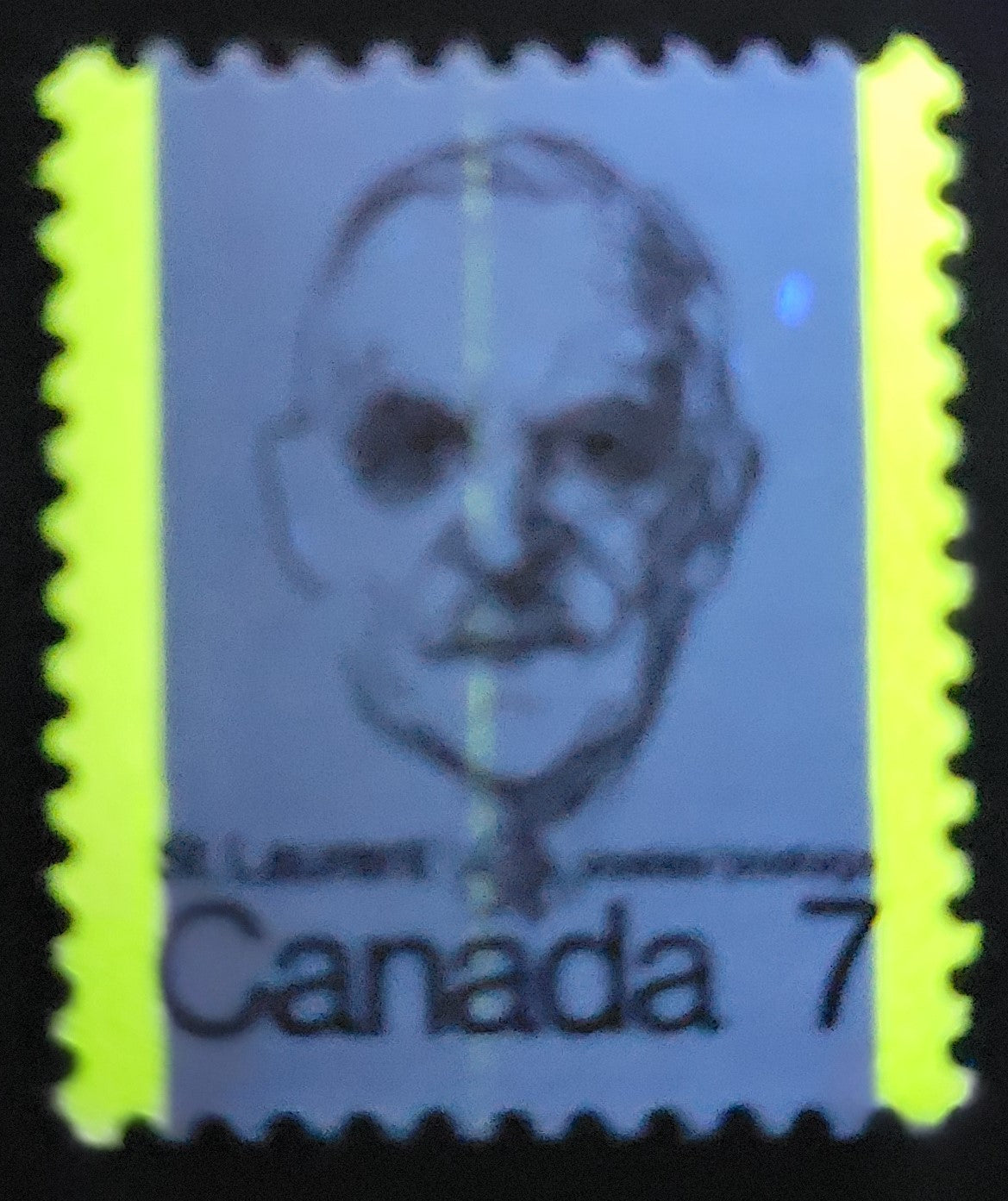 Lot 165 Canada #592var 7c  Dark Brown Louis St. Laurent, 1973-1978 Caricature Issue, A VFNH Single Vertical Hairline Tagging Streak Running Down Middle Of Stamp, DF1/DF2 Vertical Ribbed Paper, Near Invisible Tagging, Satin PVA Gum, BABN Printing