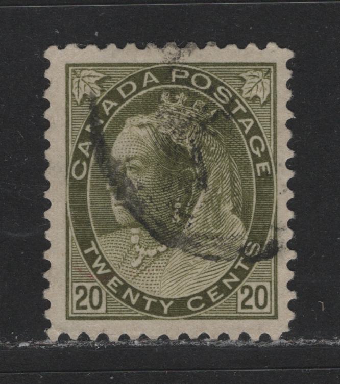 Lot 459 Canada #84 20c Olive Green Queen Victoria, 1898-1902 Numeral Issue, A Fine Used Single VF Appearance But Lower Left Perforation Tip Is Creased, So Fine