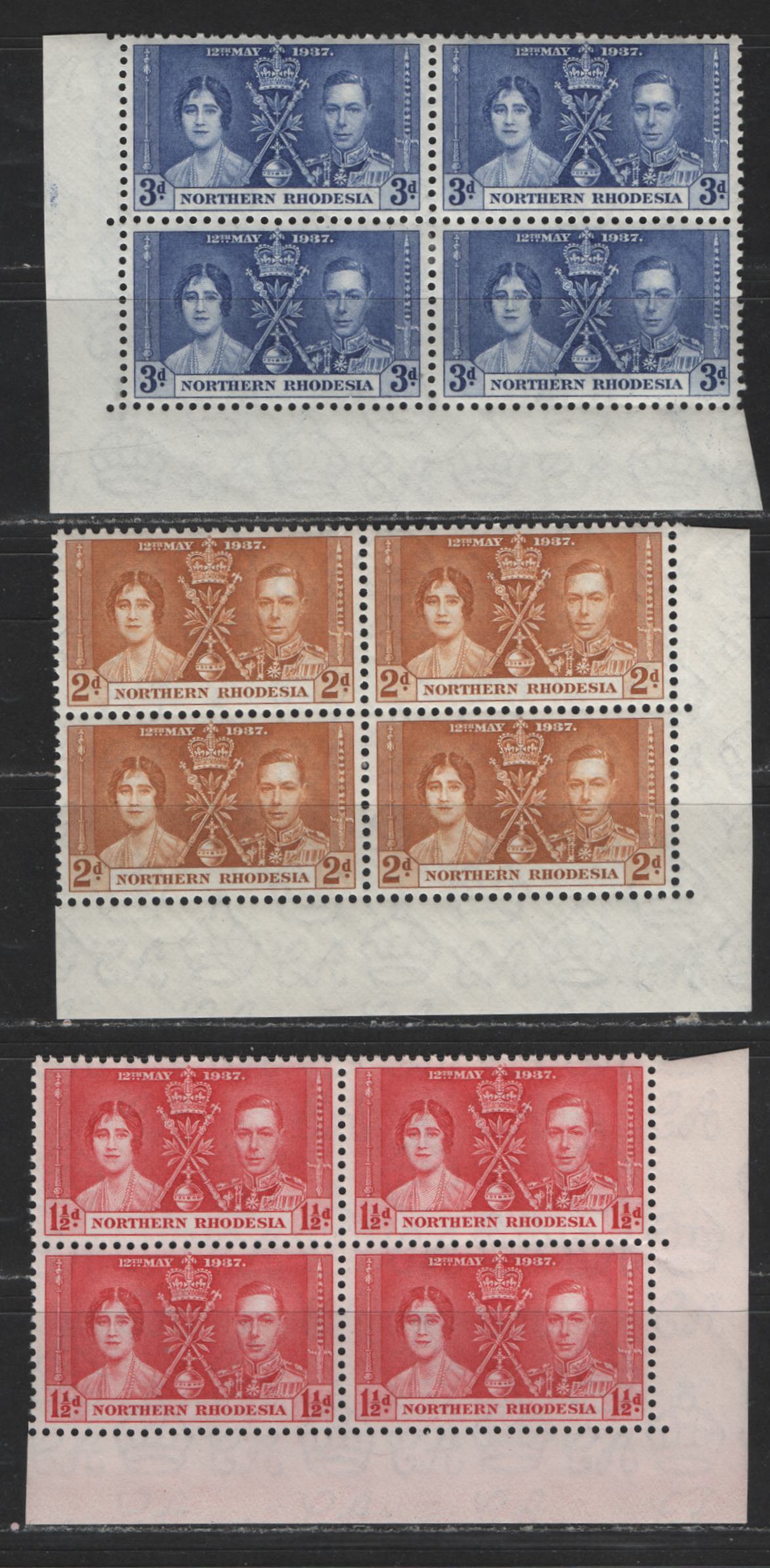 Lot 523 Northern Rhodesia #22-24 1.5d-3c Carmine Red - Dull Ultramarine King George VI & Queen Elizabeth, 1937 Coronation Issue, 3 VFOG/NH Corner Blocks Scarce, As Most Were Broken Up