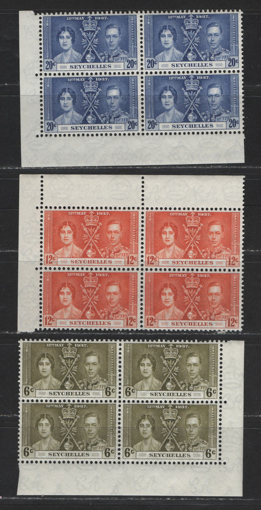 Lot 530 Seychelles #122-124 6c-20c Sage Green - Dull Ultramarine King George VI & Queen Elizabeth, 1937 Coronation Issue, 3 VFOG/NH Corner Blocks Scarce, As Most Were Broken Up