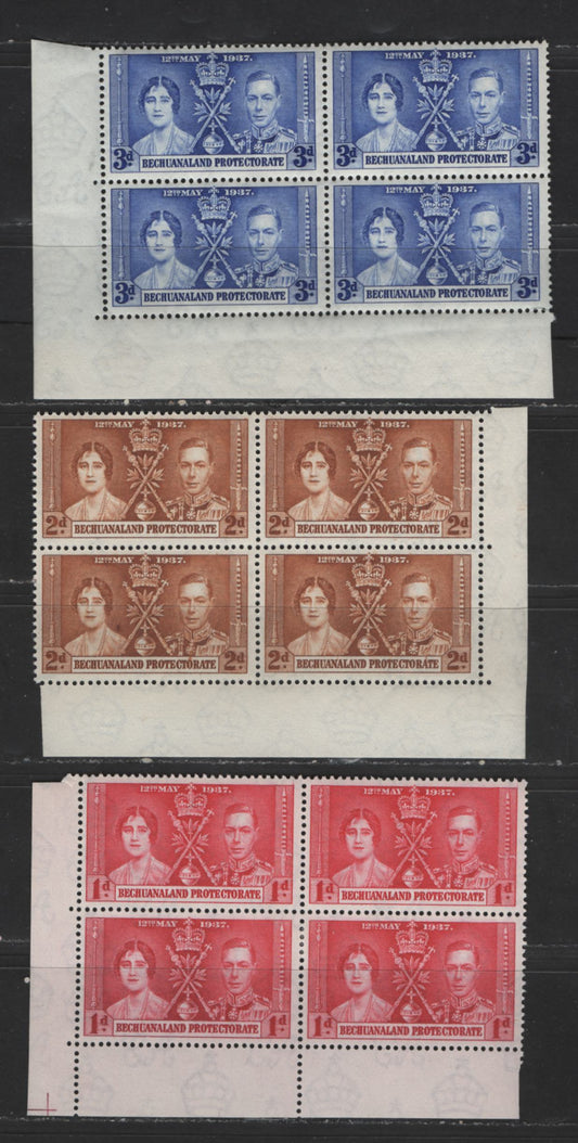 Lot 112 Bechanaland Protectorate #121-123 1d-3d Carmine Red - Bright Ultramarine King George VI & Queen Elizabeth, 1937 Coronation Issue, 3 VFOG/NH LL Corner Block Scarce, As Most Were Broken Up, 1d With Cutting Guideline In LL Corner